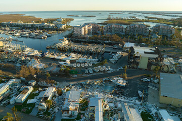 Boat station destroyed by hurricane wind in Florida coastal area. Consequences of natural disaster