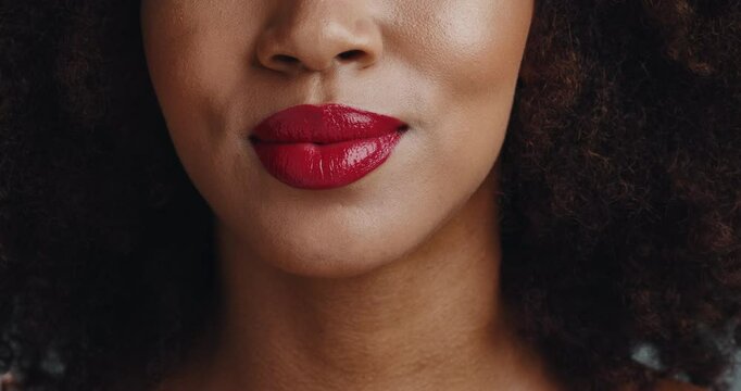 Mouth, lipstick and kiss in studio with makeup, sign and symbol with love, care and cosmetics. Person, red lips and pout with gloss for beauty with emoji, transformation and color with change