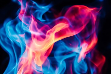 Obraz premium Abstract vibrant blue and red fire flames on black background.