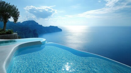 Fototapeta premium Infinity pool overlooking ocean