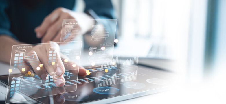 Market research, Business analysis. Businessman using digital tablet analyzing digital marketing data and financial report for online marketing plan and strategy, business intelligence and development