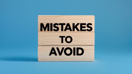 Message about mistakes to avoid displayed on blocks with a background. Conceptual symbol for mistakes to avoid. Space for copying.