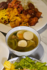 Traditional Indonesian chicken dish, captured on March 12, 2025. Tender chicken cooked with rich spices and herbs, creating a flavorful and aromatic meal