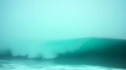Fototapeta premium Misty Ocean Wave Rolling to Shore