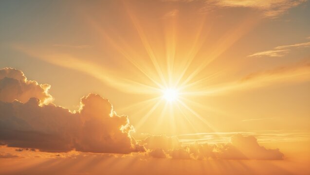 Orange sky featuring the sun and clouds in hot summer weather.