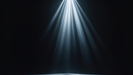 Spotlight on stage or divine rays isolated against a black backdrop.