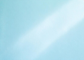 光の入った水色の壁