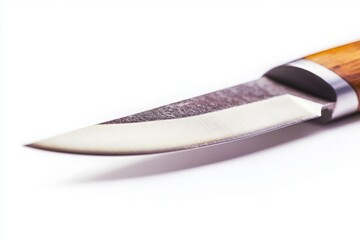 Obraz premium Close-Up of a Sharp Kitchen Knife on a White Surface, Perfect for Culinary and Cooking Content, Highlighting Precision and Quality in Food Preparation