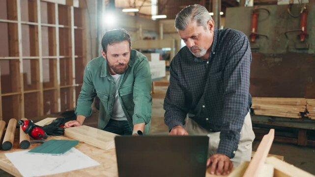 Planning, carpenter or people with laptop in warehouse for manufacturing, workshop or furniture production. Teamwork, carpentry apprentice or online update for timber, lumber or construction business