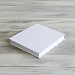 Fototapeta premium Blank White Book Mockup on Wooden Surface