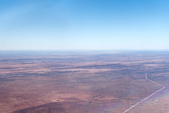 C15 dirt road in barren Kalahari desert countryside, near Uhlenhorst, Namibia