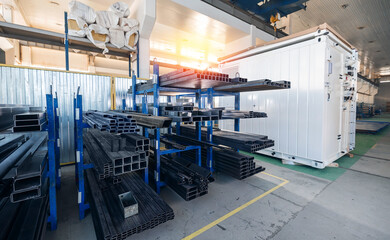 Industrial factory warehouse with steel profiles and equipment
