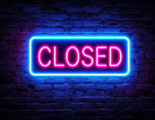 Neon "closed" sign on brick wall - nighttime business closure concept for signage