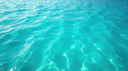 Obraz premium Ocean's Gentle Undulation A Serene Aquatic Vista of Turquoise Waves