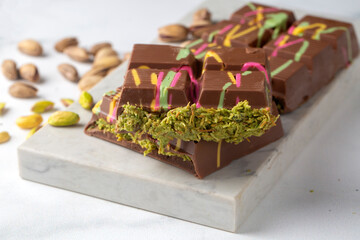 New trend chocolate; Chocolate with pistachio paste and kadayif; Dubai chocolate.