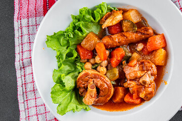 Ragout meat, sausages, vegetables stew dish fresh tasty food delicious gourmet food background on...