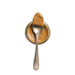 a spoon with peanut butter on it