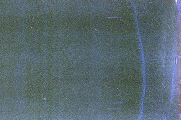 Blank grained film strip texture background with heavy grain, dust and light leak