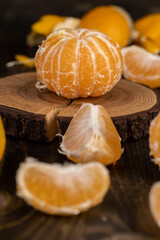 peeled orange ripe tangerines on the table