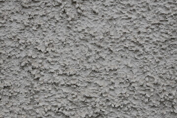 A wall with a grey texture