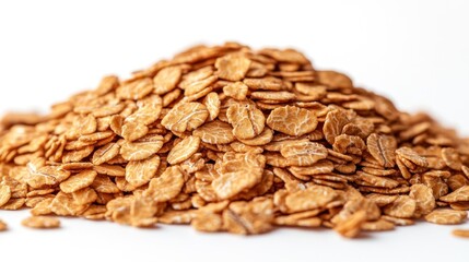 Pile of golden oat flakes on white background (1)