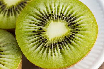 Macro Shot of Freshly Sliced Kiwi Fruit with Vibrant Green Flesh
