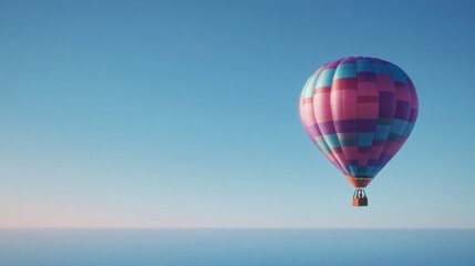 Fototapeta premium vibrant colorful hot air balloon partially inflates against clear sky capturing anticipation of flight with its array