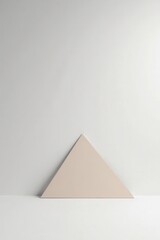 A Pale Triangle Shape Against a Simple White Background, Ideal for Minimalist Designs and Presentations