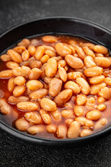 White bean tomato sauce delicious gourmet food background on the table rustic food top view copy space keto and paleo diet vegetarian and vegan food