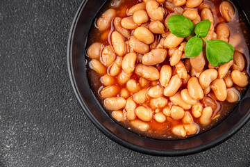 White bean tomato sauce delicious gourmet food background on the table rustic food top view copy space keto and paleo diet vegetarian and vegan food