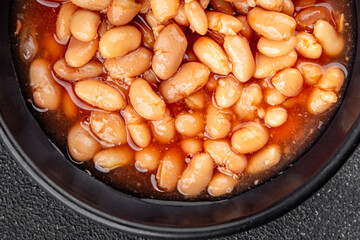 White bean tomato sauce delicious gourmet food background on the table rustic food top view copy space keto and paleo diet vegetarian and vegan food