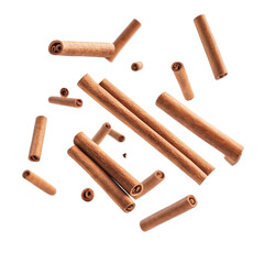 Cinnamon sticks falling vibrant background warm spice aroma