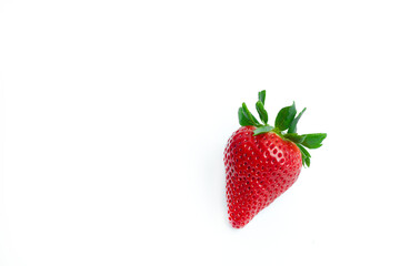 A fresh, ripe strawberry with bright red color and green leaves isolated on a white background. Perfect for food photography, healthy eating concepts, organic branding, and commercial design use.