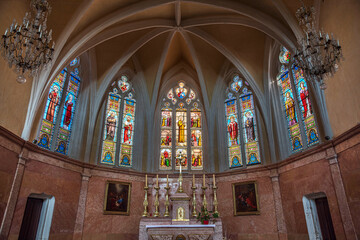 Interior of the church in the town of Arnay le Duc in Burgundy, France, with its stained glass...