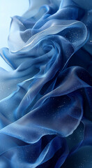 Obraz premium Close-up of a vibrant blue, translucent fabric, with a soft, flowing texture, exhibiting a subtle ombre effect.