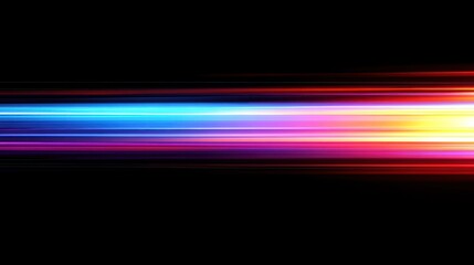 Abstract colorful light streaks on black background.