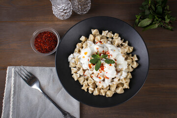 Traditional Turkish cuisine; Turkish ravioli, Turkish name; Manti