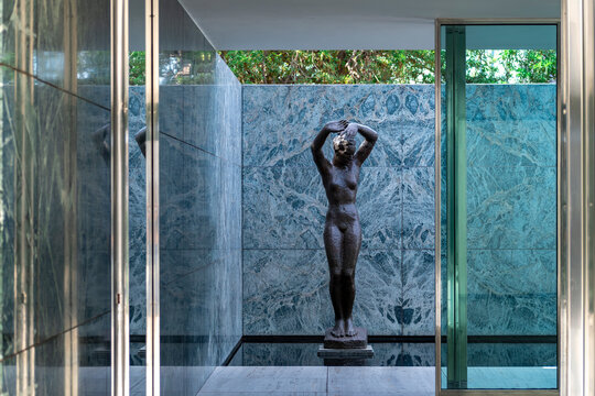 Alba statue by Georg Kolbe and reflection pool at Mies van der Rohe's Barcelona Pavilion, Barcelona, Spain