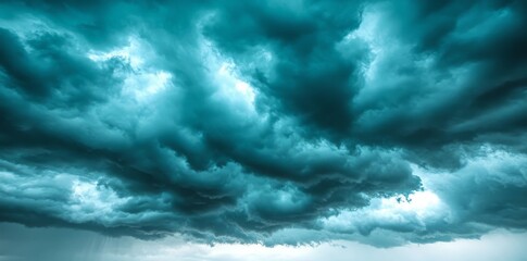 Obraz premium The sky, dark and moody with swirling clouds, was lit by a soft, eerie light, producing a dramatic and atmospheric ambiance