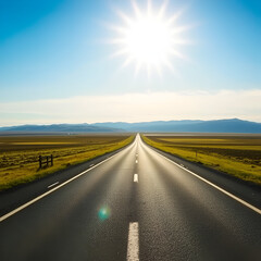 Naklejka premium Vast empty road in summer with sunburst in bright blue sky overhead; Austurland, Northern region, Iceland