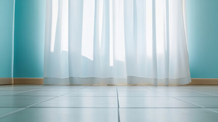 Natural light filters through sheer curtains in a tranquil room with light blue walls and tiled floor on a sunny day