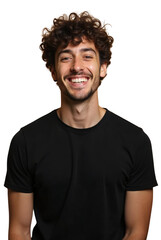  a smiling man against a white background. He has curly hair and a short beard and is wearing a black t-shirt.