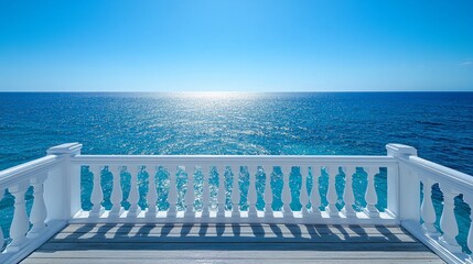 Calm sea view from a white balcony on a bright sunny day overlooking crystal clear waters