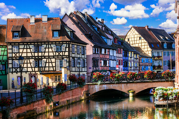 France, Alsace region. Colorful traditional town Colmar with scenic romantic canals, popular tourist attraction, wine route destination.