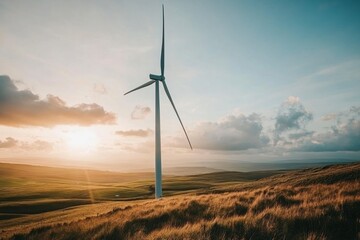 Wind Turbine Stands Tall on Grassy Hillside at Sunset