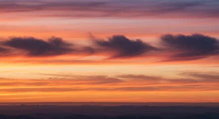 Obraz premium Dramatic Cloudscape at Sunset with Orange and Pink Sky Horizon View