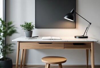 A clean and minimalist home office setup with a white marble desk, wooden legs, and matching stool, featuring an open book on top of it.