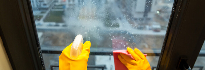 A Housewife Cleaning the Window: A Symbol of Freshness and Cleanliness