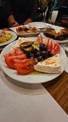 Raki appetizer with cheese olive and tomatoes