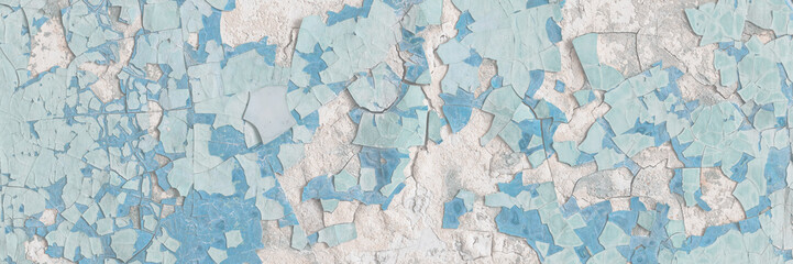 Peeling paint on the wall. Old concrete wall with cracked flaking paint. Weathered rough painted surface with patterns of cracks and peeling. High resolution texture for background and design. Closeup